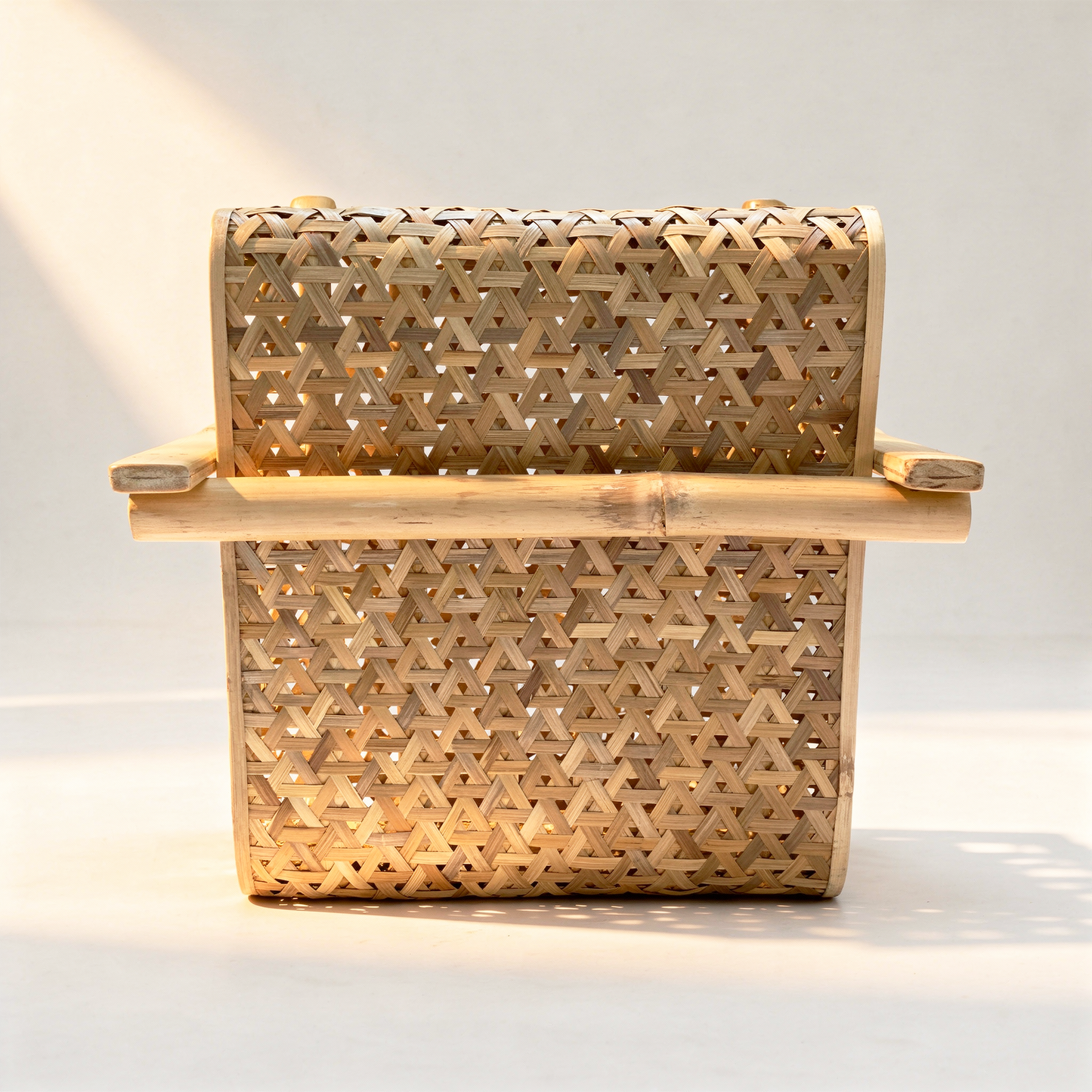 Koo-Boo Lounge Chair by TIBA-TIBA – rear view of a modern bamboo lounge chair with woven triangle bamboo seat and back, Indonesian design, luxury bamboo lounge chair.