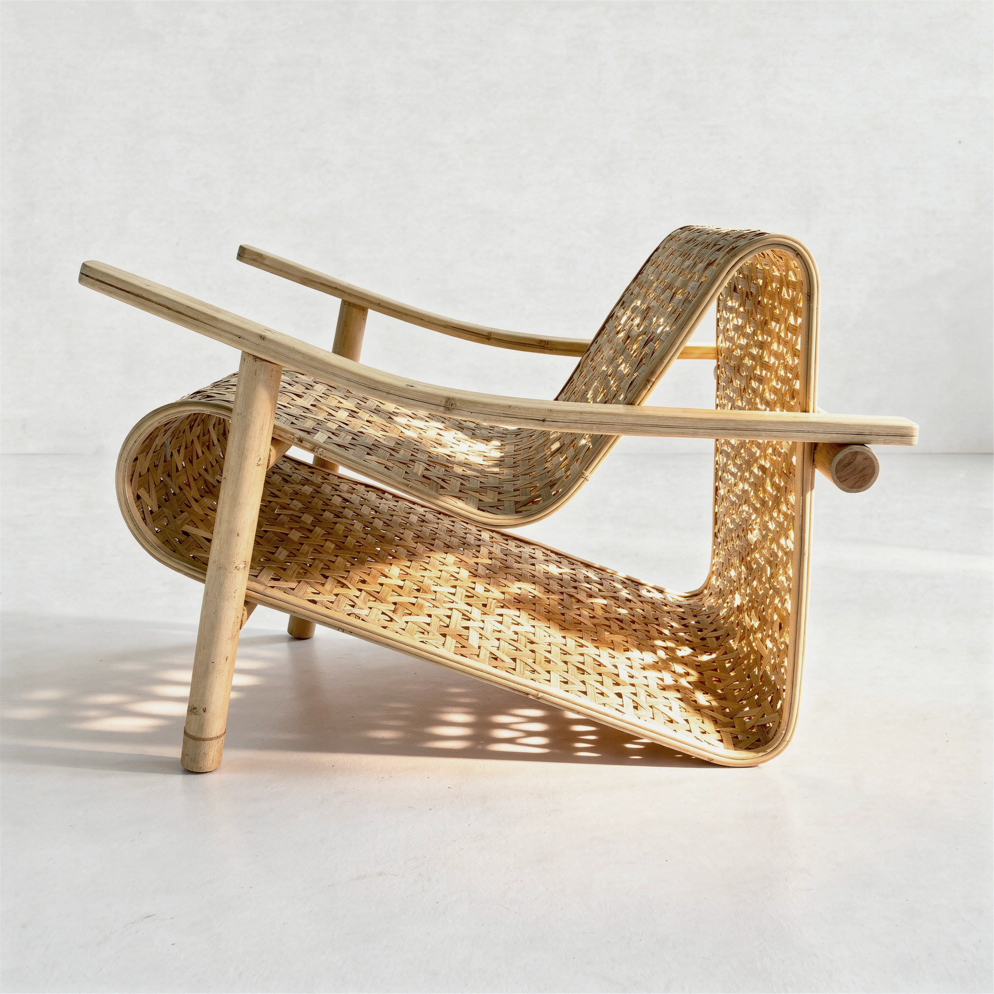 Koo-Boo Lounge Chair by TIBA-TIBA – modern bamboo lounge chair with woven triangle bamboo seat, Indonesian design, unique laminated and woven bamboo lounge chair, side view.  