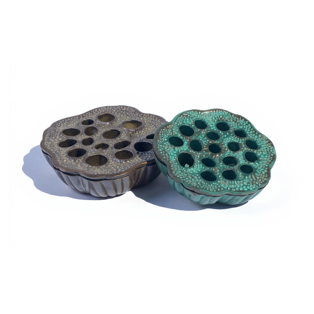 Lotus Pod Ashtray by TIBA-TIBA - Two lotus pod brass ashtrays in Natural Bronze and Antique Green finish. 