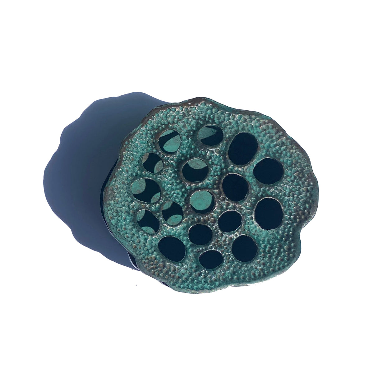 Lotus Pod Ashtray by TIBA-TIBA – sculptural bronze ashtray in antique green finish as a nature inspired paperweight, top view. 