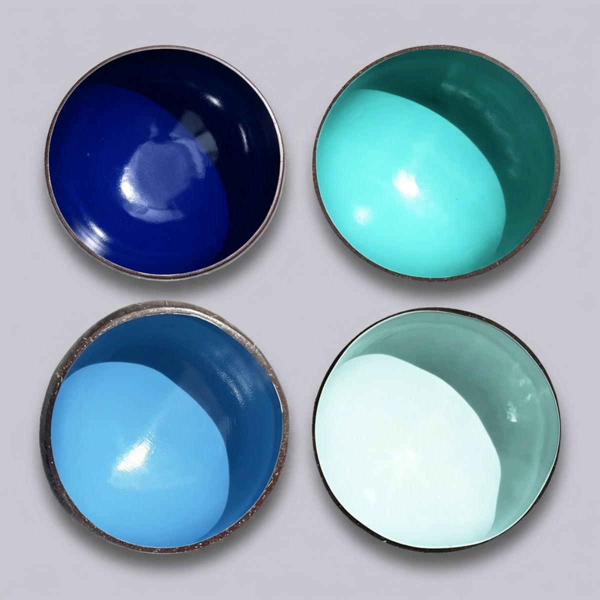Dots 4 Pack Ocean Palette by TIBA-TIBA – Four tropical coconut bowls in Astral Blue, Sky Blue, Turquoise and Ultramarine blue.