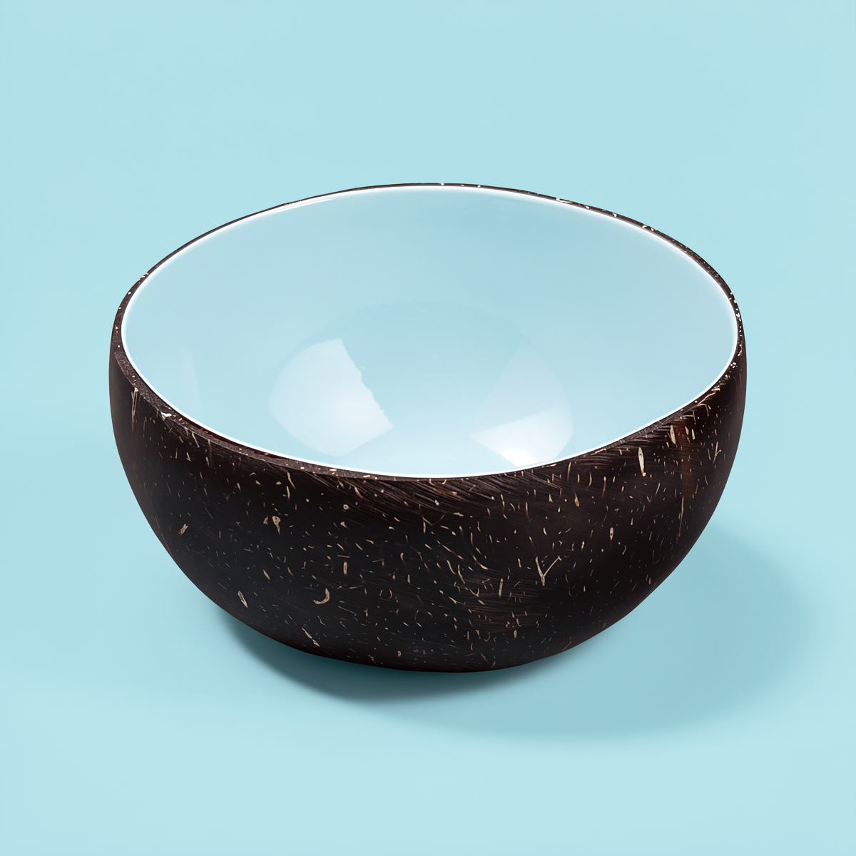 Dots Coloured Coconut Bowls by TIBA-TIBA – Pale blue coloured coconut bowl on mint blue background for colourful tableware. 