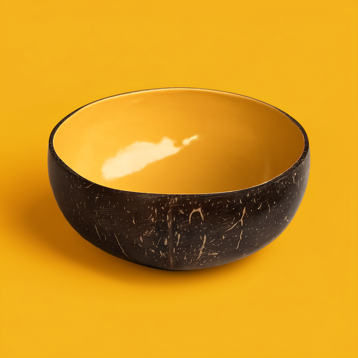 Dots Coloured Coconut Bowls by TIBA-TIBA – Mango coloured coconut bowl for tropical breakfast smoothie bowls on orange background. 