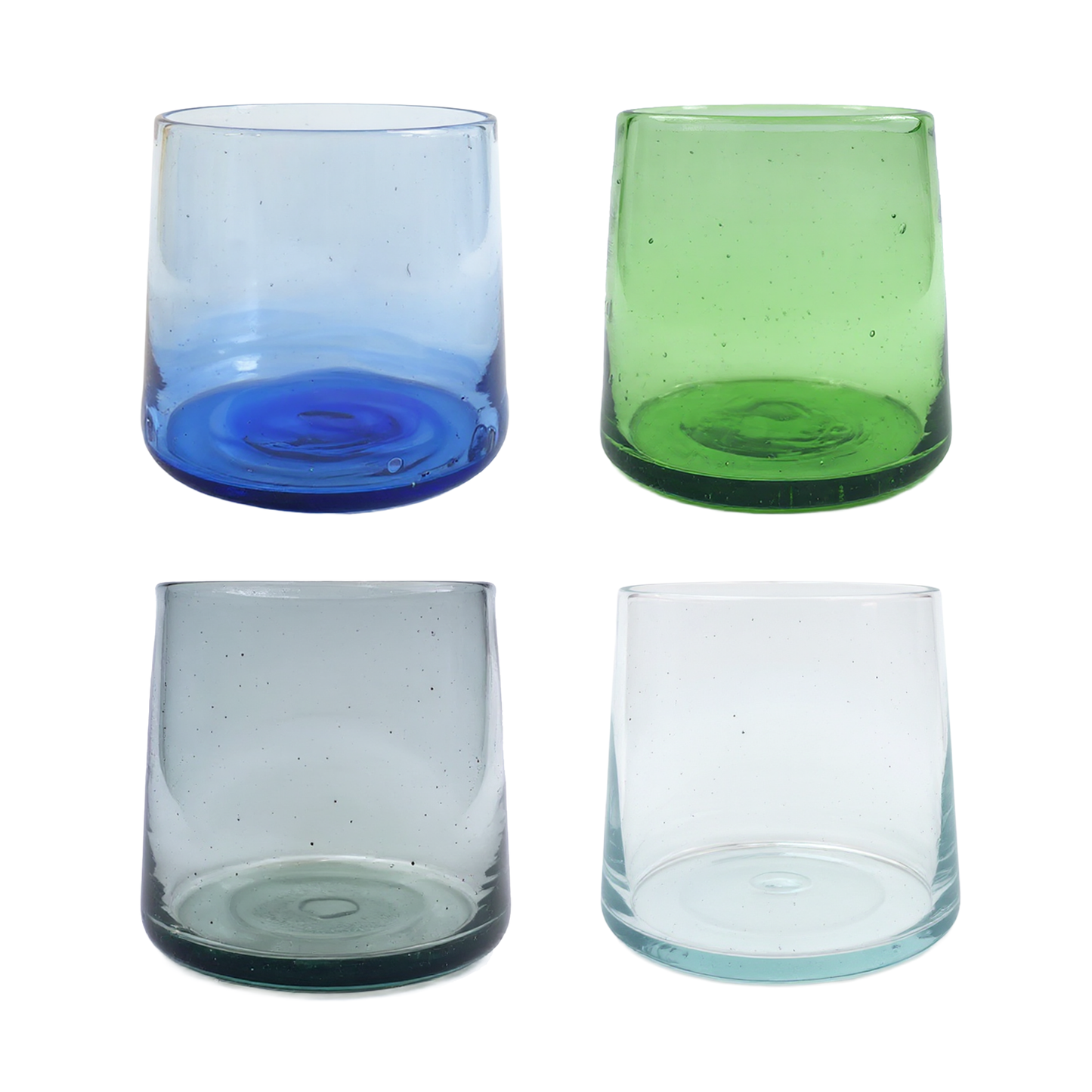 Tube Short Tumblers by TIBA-TIBA – set of four hand-blown recycled glass tumblers in green, blue, smoke, and clear on white background. 