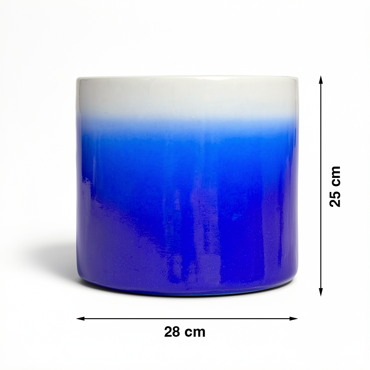 Fade Cylinder planter by TIBA-TIBA – Dark blue terracotta plant pot with a glossy, glazed gradient finish that fades to white at the top. 