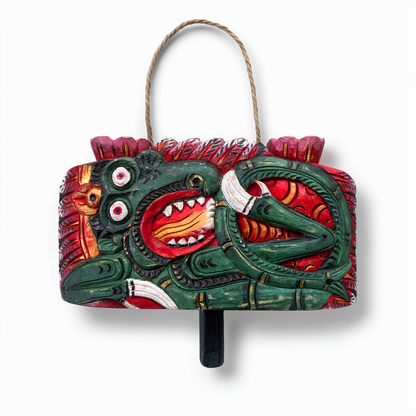 Lonceng Sapi Cowbell by TIBA-TIBA – 
Mahogany hand-carved, hand-painted cowbell, hanging decoration with green dragon design 