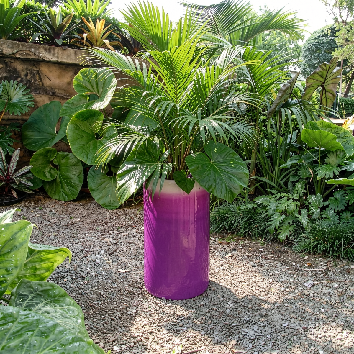 Fade Cylinder planter by TIBA-TIBA – Tall purple gradient planter with tropical fern plants outdoors in Balinese garden. 