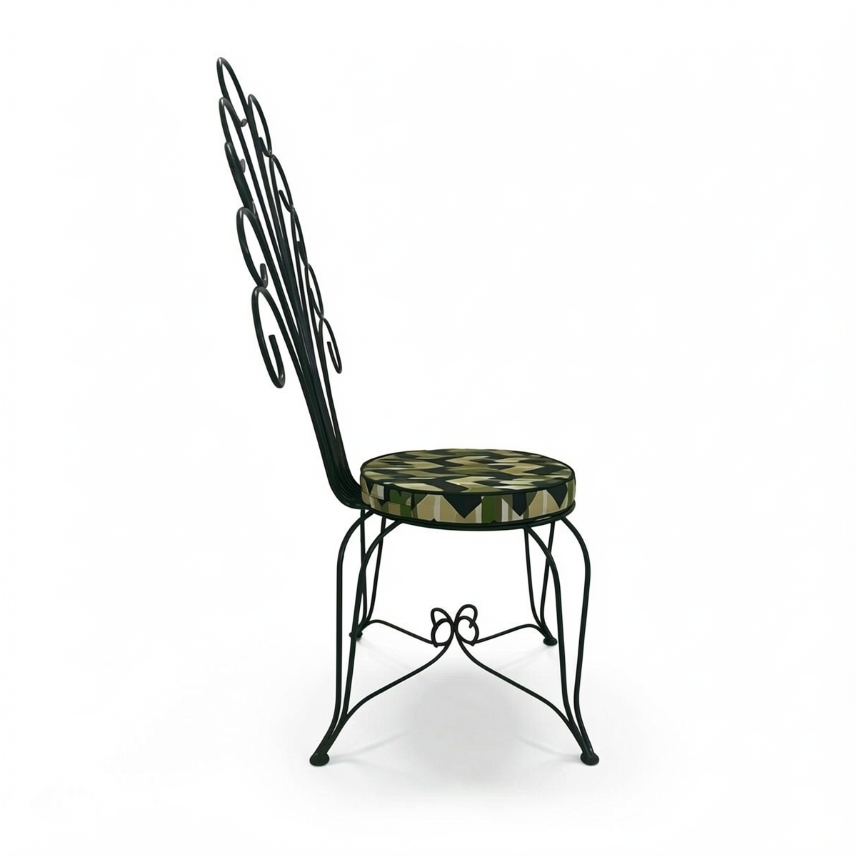 Plume Chair by TIBA-TIBA – metal peacock garden chair with curved metal frame and green patterned QDF cushion, side view. 