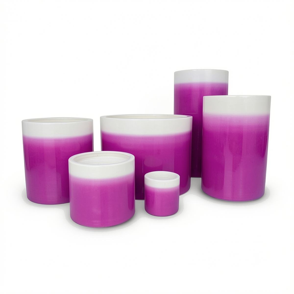 Fade Cylinder planters by TIBA-TIBA – Group of six glossy purple to white ombre ceramic pots of varying sizes.