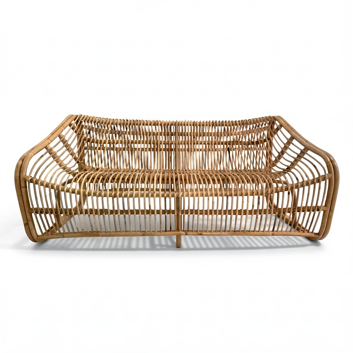 Bucket 2-Seater Sofa by TIBA-TIBA – Natural rattan two-seat lounge sofa with sculptural curved frame
