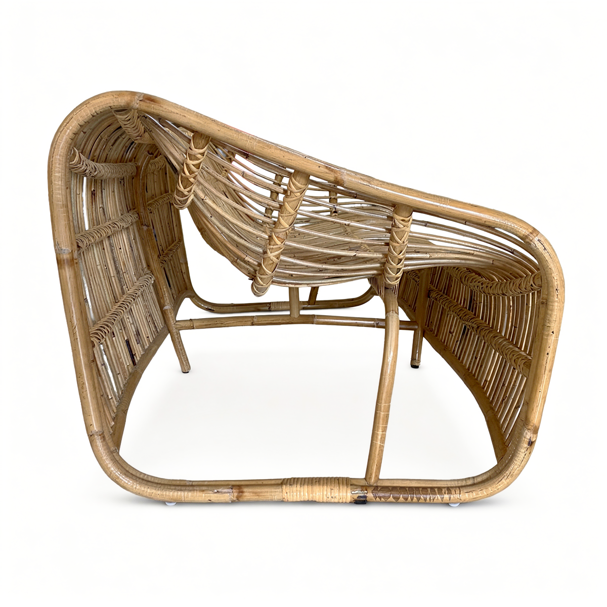 Bucket 2-Seater Sofa by TIBA-TIBA – minimalist rattan two-seat sofa with sweeping curved frame side view