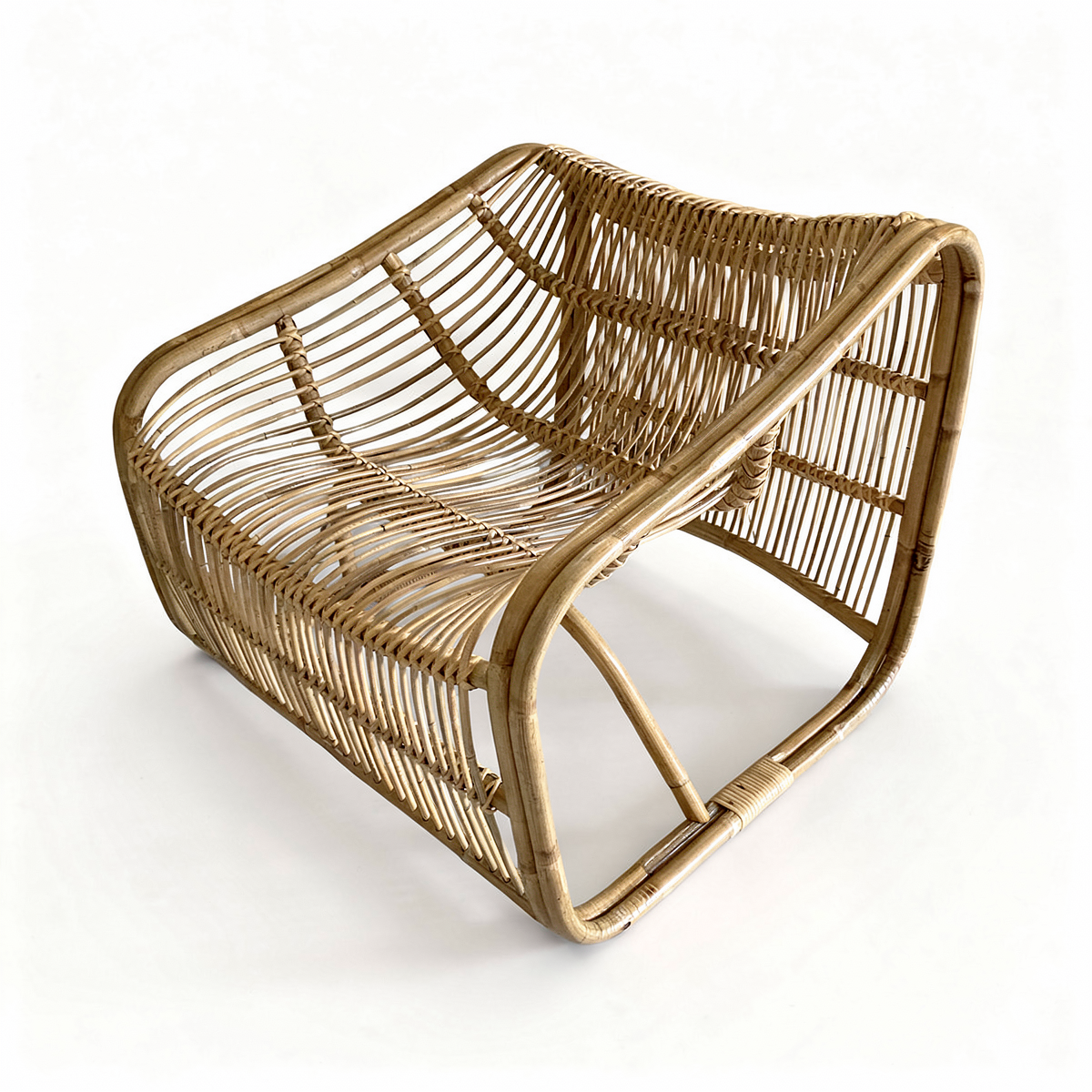 Bucket Lounge Chair by TIBA-TIBA – unique natural rattan lounge chair with organic curves and modern Italian design, hand crafted in Indonesia for relaxed tropical living.