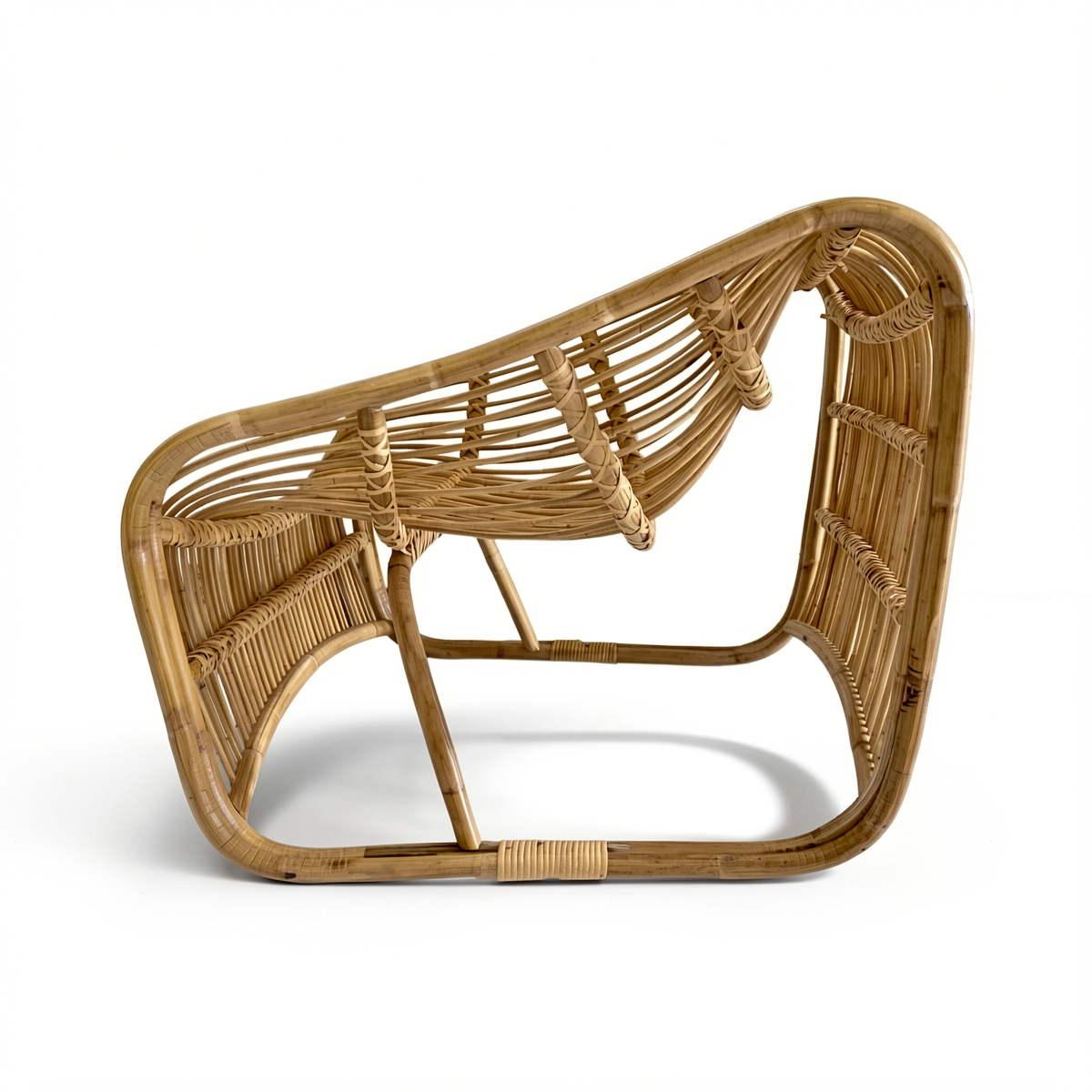 Bucket Lounge Chair by TIBA-TIBA – unique natural rattan lounge chair with organic curves and modern Italian rattan design, hand crafted in Indonesia for relaxed bohemian living.