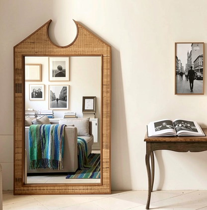 Chippendale Standing Mirror by TIBA-TIBA - Jumbo antique rattan and teak mirror leaning against living room wall 