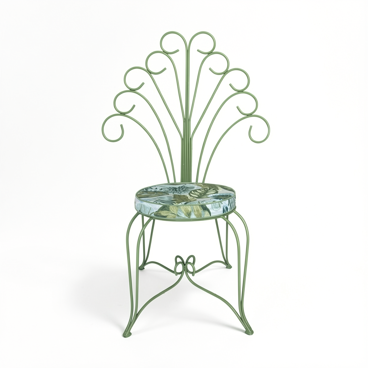 Plume Chair by TIBA-TIBA – powder-coated sage green steel peacock chair with curled metal frame and sage green tropical foliage outdoor cushion, front view. 