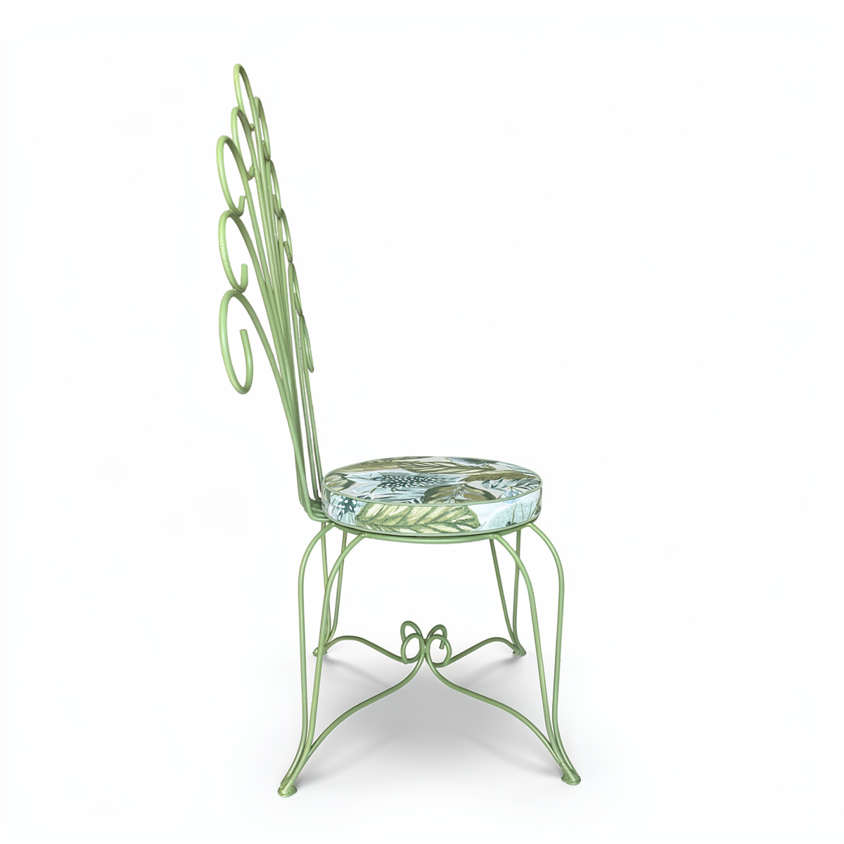 Plume Chair by TIBA-TIBA – sage green metal peacock garden chair with curved metal frame and blue and green jungle leaf QDF cushion, side view. 