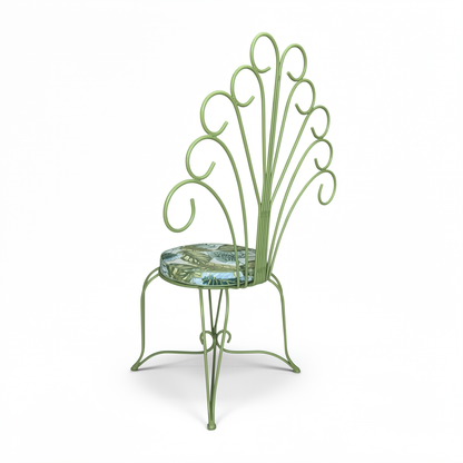 Plume Chair by TIBA-TIBA – sage green steel peacock chair with decorative curved metal backrest and matching tropical plant round cushion