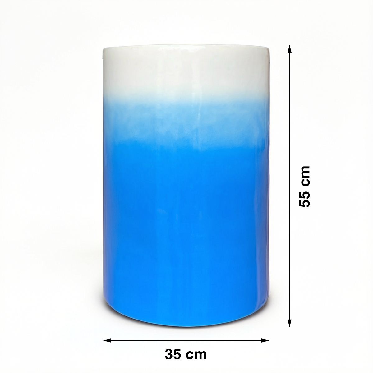 Fade Cylinder planter by TIBA-TIBA – Sky blue ceramic planter with a high-gloss, ombre glaze finish that fades to white at the top. 