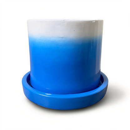 Tatakan plant saucer by TIBA-TIBA – sky blue high-gloss glazed terracotta planter drip tray under sky blue Fade Pot. 