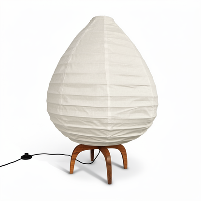 Alien Floor Lamp by TIBA-TIBA – teardrop-shaped linen floor lamp with four teak feet. 