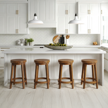Three Sixty Stools by TIBA-TIBA – Four teak wood counter stools with rotating seats at white solid surface kitchen counter in white modern kitchen. 