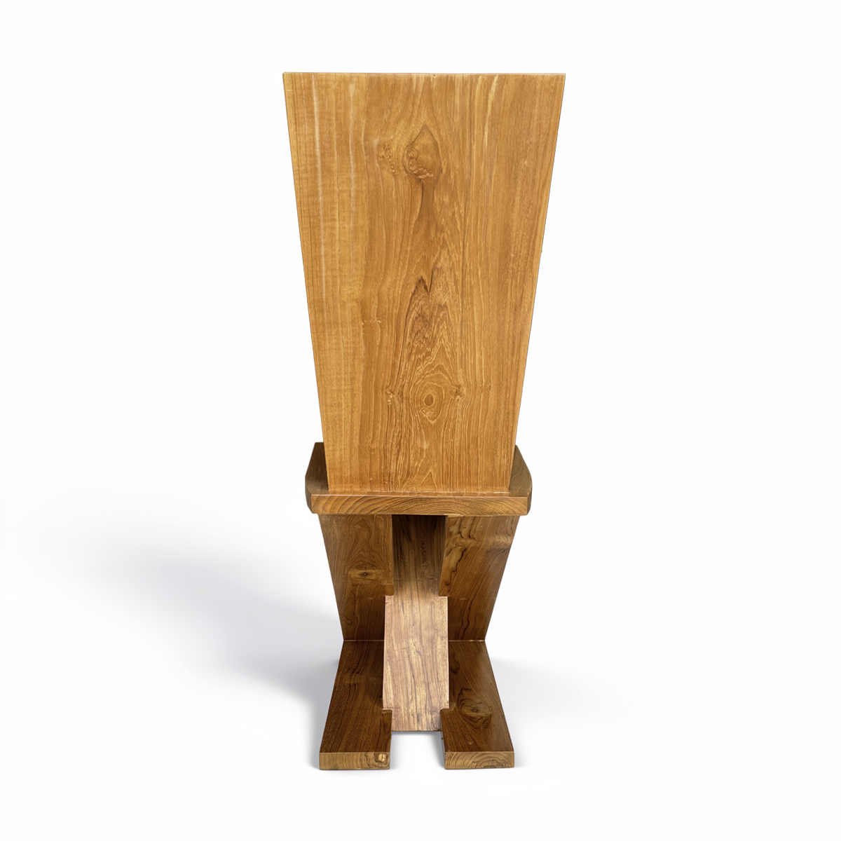 Zag-Zig Chair by TIBA-TIBA – teak dining chair with solid plank backrest and bold geometric Z-shaped base. Rear view. 