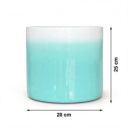 Fade Cylinder planter by TIBA-TIBA – Turquoise terracotta plant pot with a glossy, glazed gradient finish that fades to white at the top. 