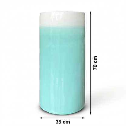 Fade Cylinder planter by TIBA-TIBA – Turquoise and white terracotta planter with a glossy, ombre finish. Handmade in Java.