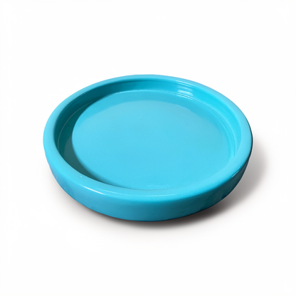 Tatakan plant saucer by TIBA-TIBA – turquoise glossy glazed terracotta planter saucer. 