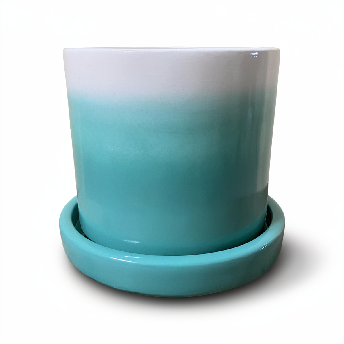 Tatakan plant saucer by TIBA-TIBA – turquoise high-gloss glazed ceramic planter drip tray under turquoise Fade Pot. 