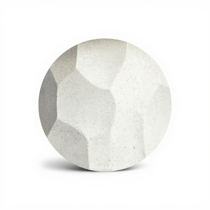 Jetty Side Table by TIBA-TIBA — sculptural white stone texture of random geometric hexagons part of the modern tropical furniture collection.