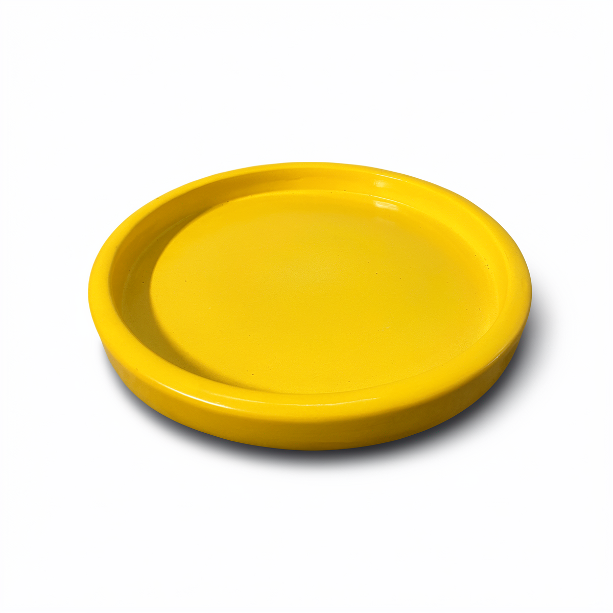 Tatakan plant saucer by TIBA-TIBA – yellow glossy glazed ceramic plant plate. 